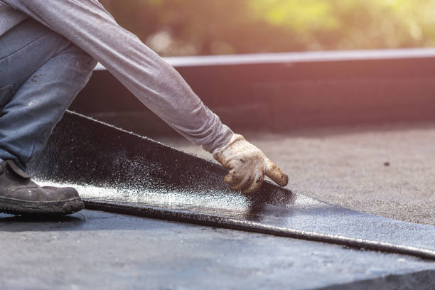 Professional Waterproofing technician working in Williamstown, KY